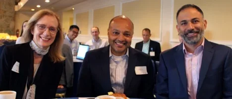 Dr. Mangione, Duru, and Vahedi are sitting at a table at the RCMAR CHIME in Oct 2019
