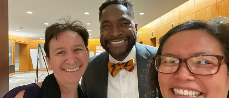 Drs. Melissa Gerald and Utive Essien are pictured with Cristina Punzalan at conference.