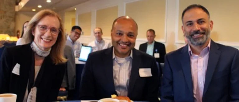 Dr. Mangione, Duru, and Vahedi are sitting at a table at the RCMAR CHIME in Oct 2019