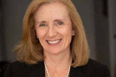 Headshot of Carol Mangione