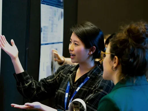 young-female-researcher-poster-session-retreat