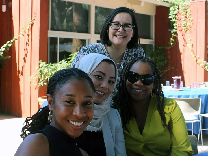 Group of female CHIME scientists smiling