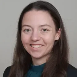 Woman smiling with dark hair