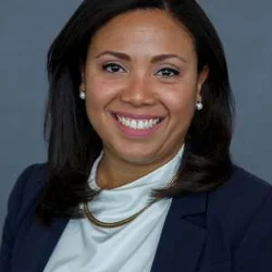 Adys is pictured here smiling.