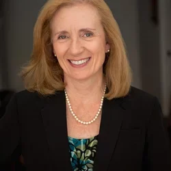 Headshot of Carol Mangione