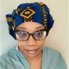 Headshot of Sha’Shonda Revels